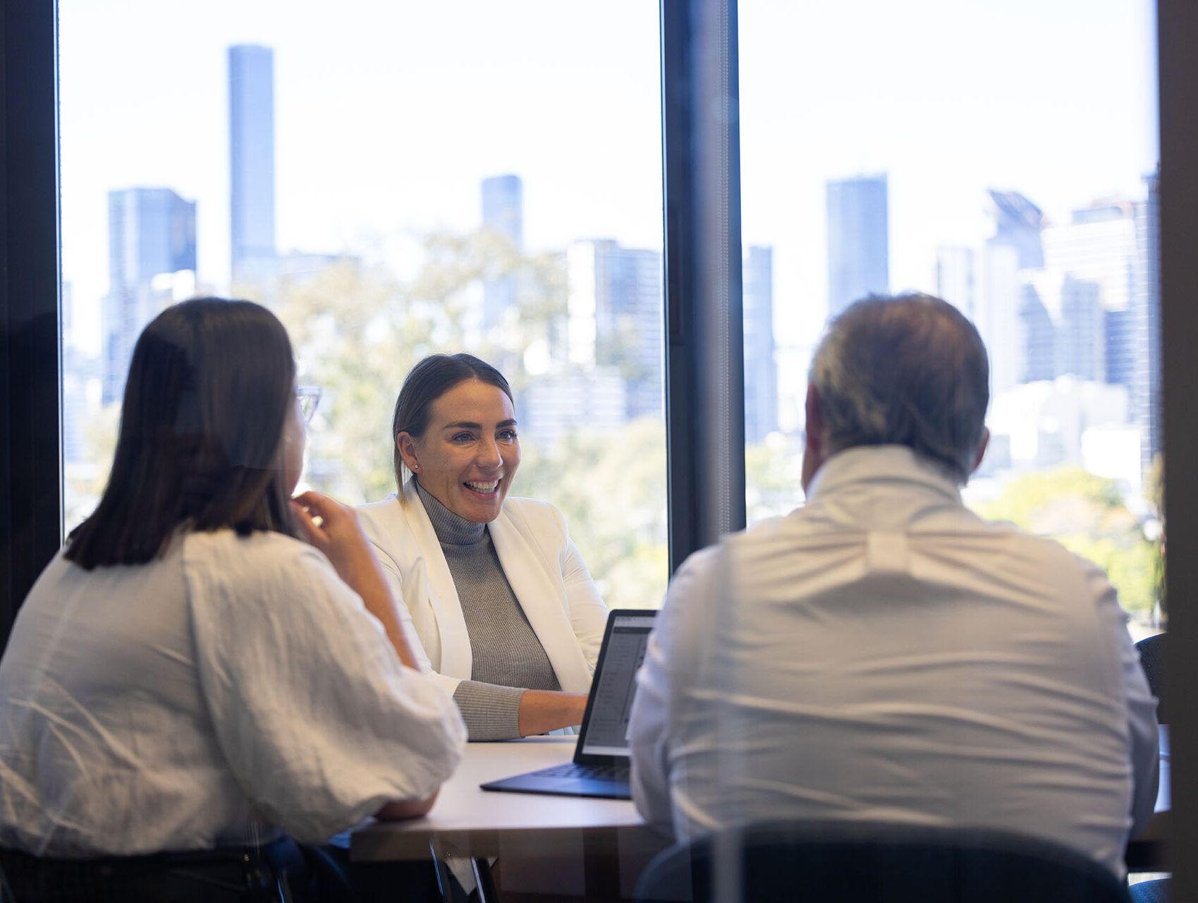 Office lady giving a presentation on a laptop